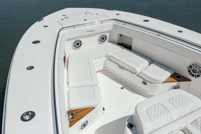 Slide: The Image of 2022 Caymas 401 CC boat with luxurious white seating and modern design. - 25