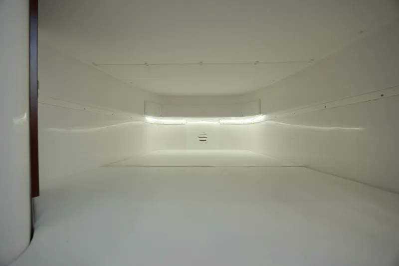 Slide: The Image of Spacious storage compartment in 2022 Caymas 401 CC boat. - 36