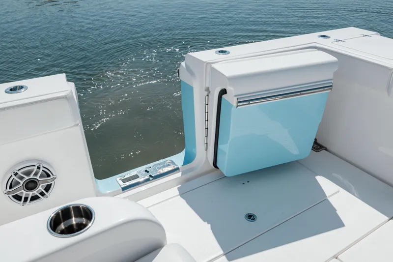 Slide: The Image of 2022 Caymas 401 CC boat with open side door and ocean view. - 43