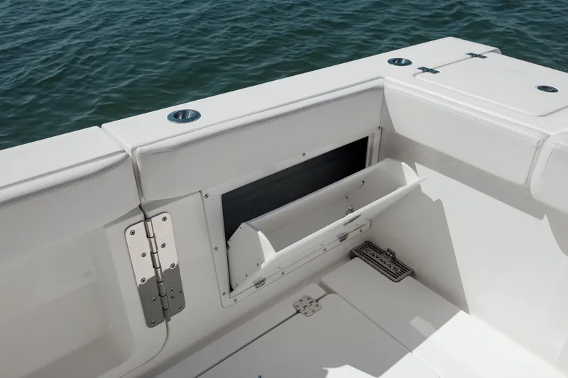 Slide: The Image of 2022 Caymas 401 CC boat storage compartment on deck. - 47