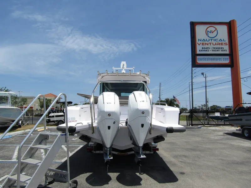 Slide: The Image of 2024 Axopar 37XC CROSS CABIN boat at Nautical Ventures dealership. - 1