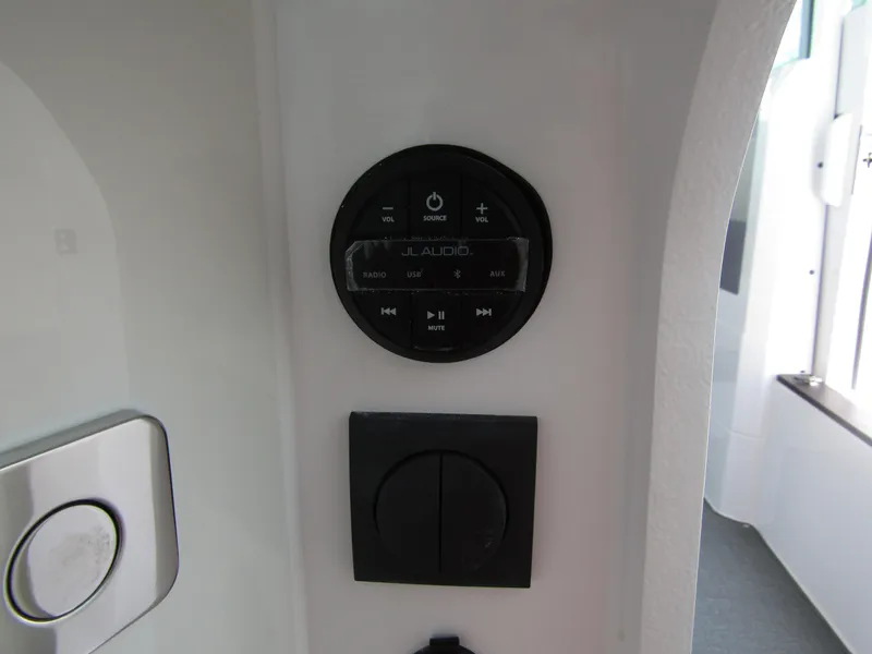 Slide: The Image of Audio control panel in 2024 Axopar 37XC Cross Cabin boat. - 25
