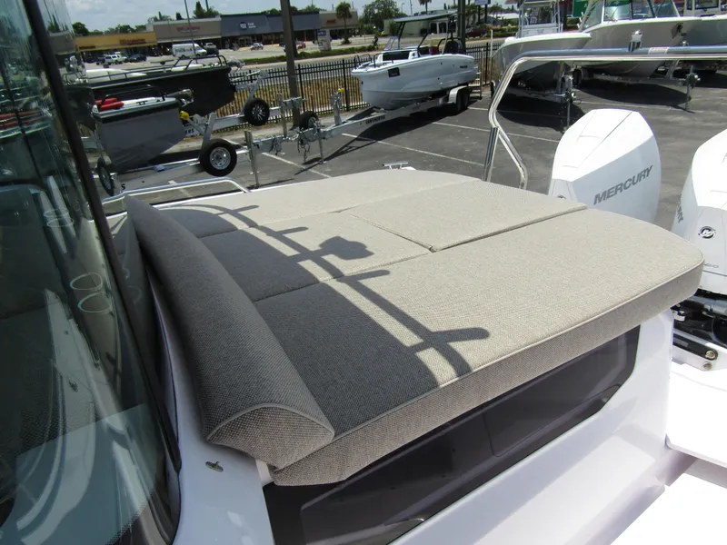 Slide: The Image of 2024 Axopar 37XC CROSS CABIN with cushioned sun deck and twin Mercury engines. - 33