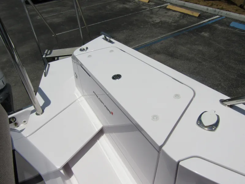 Slide: The Image of 2024 Axopar 37XC CROSS CABIN boat deck with storage compartments. - 34
