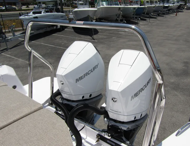 Slide: The Image of Twin Mercury outboard engines on a 2024 Axopar 37XC CROSS CABIN boat. - 36
