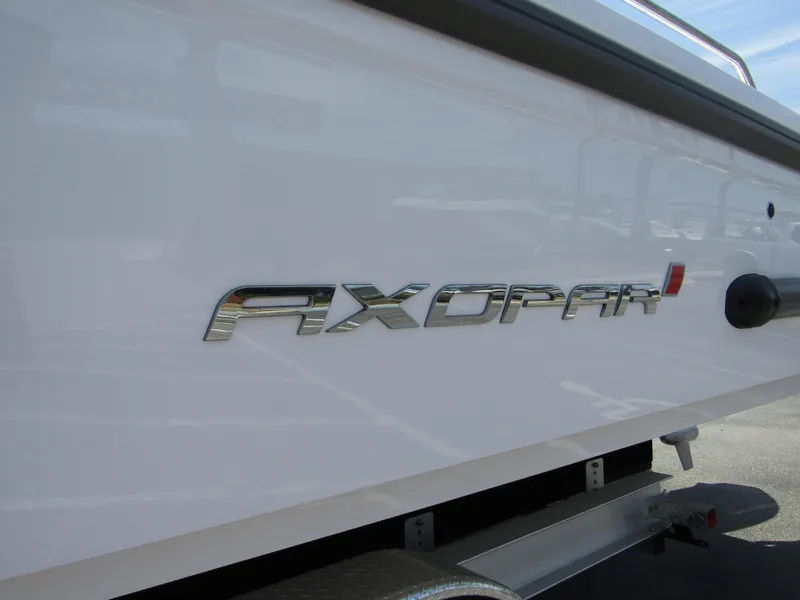 Slide: The Image of 2024 Axopar 37XC CROSS CABIN boat logo on white hull - 6