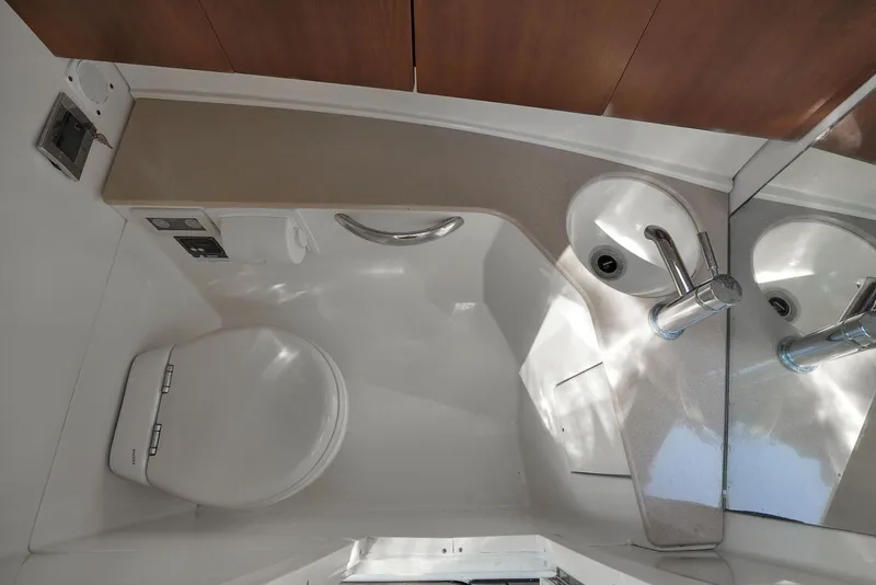Slide: The Image of 2014 Chris-Craft Launch 32 bathroom with modern sink and toilet. - 15