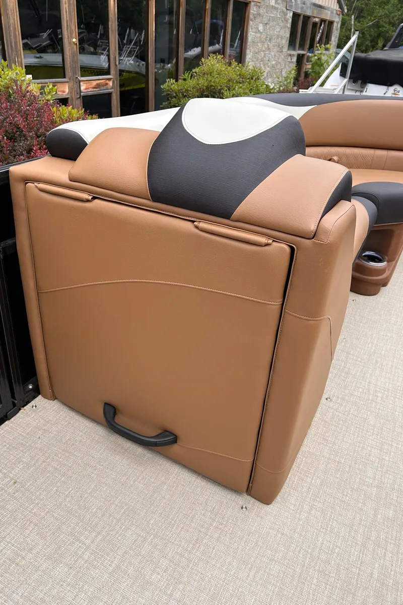 Slide: The Image of 2024 Avalon LSZ Entertainer 23' boat seating with tan and black upholstery. - 17