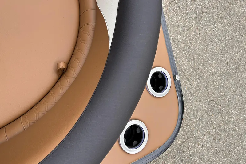 Slide: The Image of 2024 Avalon LSZ Entertainer 23' boat seating with cup holders. - 24