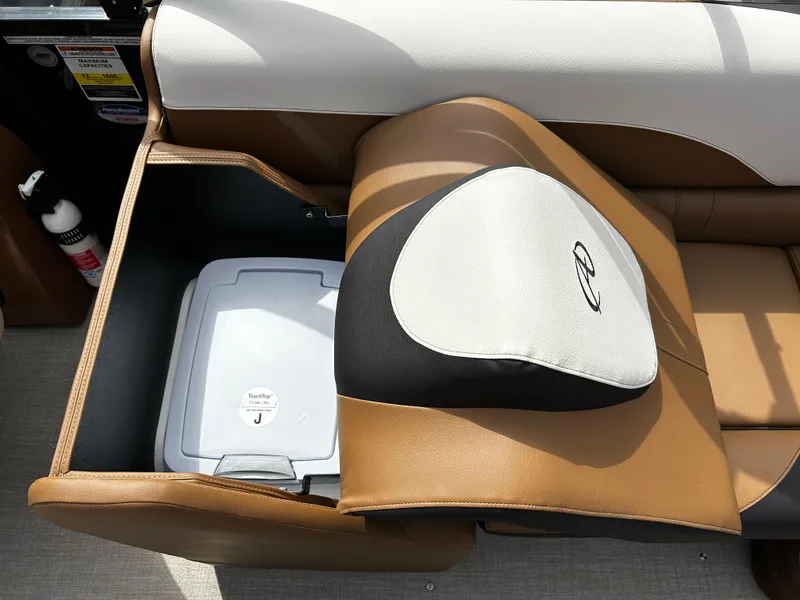 Slide: The Image of 2024 Avalon LSZ Entertainer 23' boat seat storage compartment with cooler. - 25