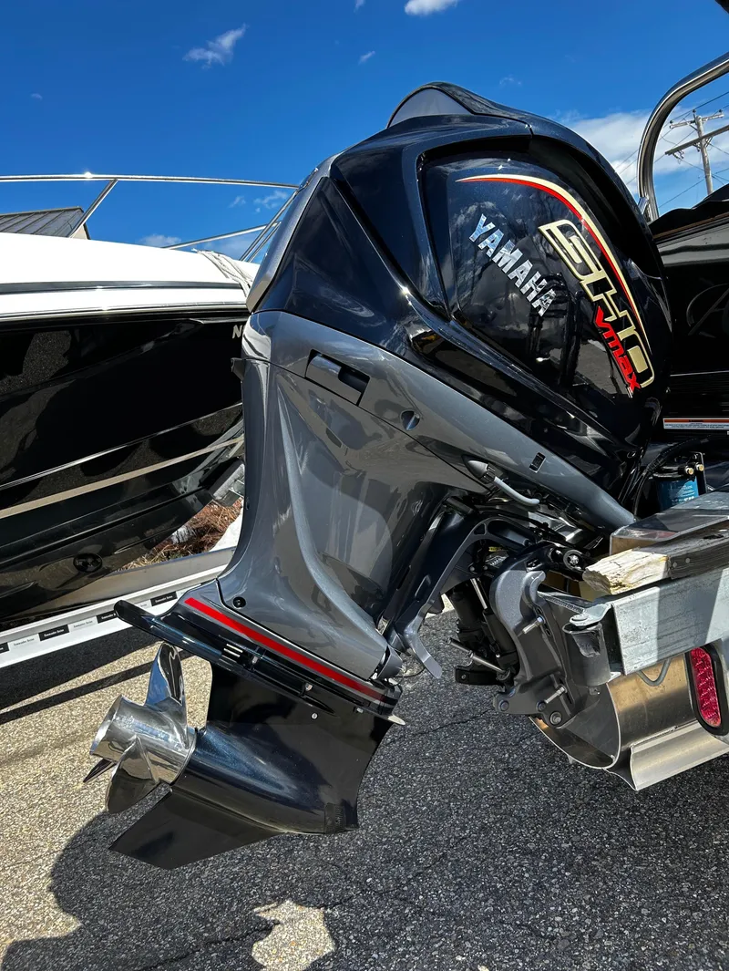 Slide: The Image of 2024 Avalon LSZ Entertainer 23' with Yamaha outboard motor. - 37