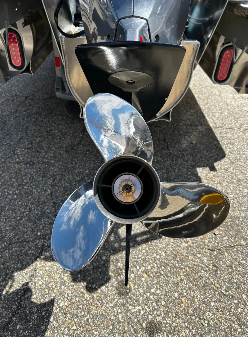 Slide: The Image of Close-up of 2024 Avalon LSZ Entertainer 23' boat propeller. - 38