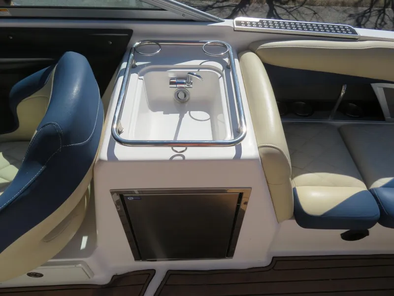 Slide: The Image of 2009 MasterCraft MariStar 255 boat interior with sink and seating. - 12