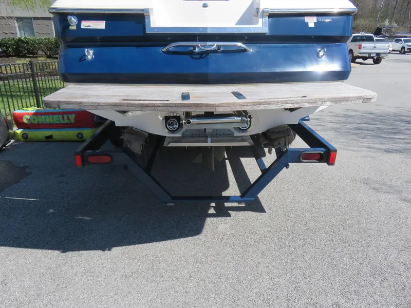 Slide: The Image of 2009 MasterCraft MariStar 255 boat rear view with trailer. - 20