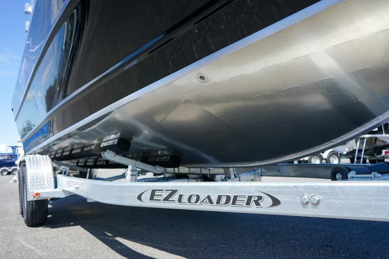 Slide: The Image of Weldcraft 240 Ocean King 2025 boat on EZ Loader trailer. - 12