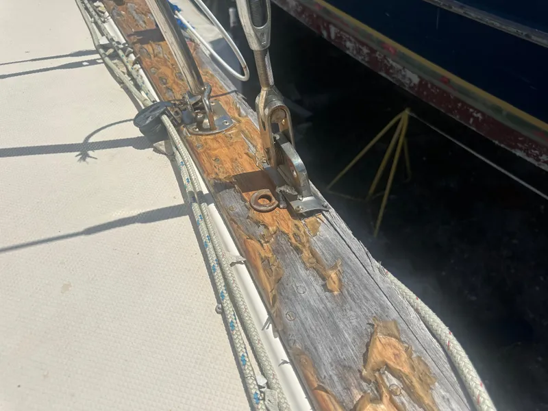 Slide: The Image of Close-up of weathered wood on a 2002 Island Packet 420 sailboat deck. - 5