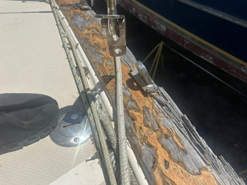 Slide: The Image of Close-up of weathered wood and rigging on a 2002 Island Packet 420 sailboat. - 6