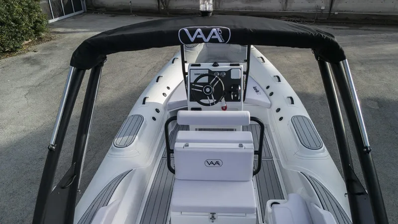 Slide: The Image of 2025 Aqvaboats Luxrib 22 inflatable boat with modern seating and steering console. - 9