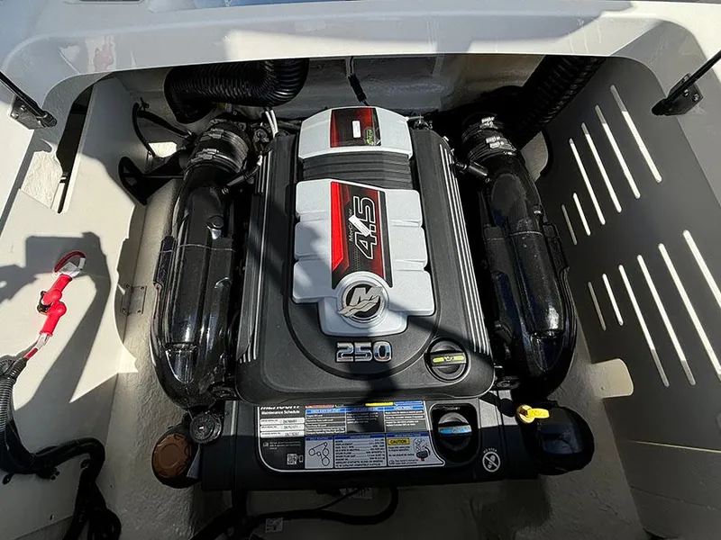 Slide: The Image of 2024 Sea Ray SPX 210 boat engine compartment with 4.5L 250 HP MerCruiser engine. - 22