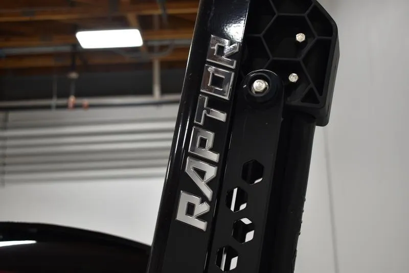 Slide: The Image of Close-up of iKon LX21 2023 model with RAPTOR branding on black metal frame. - 11