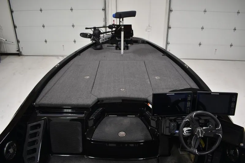 Slide: The Image of 2023 iKon LX21 fishing boat interior with advanced navigation system and spacious deck. - 7