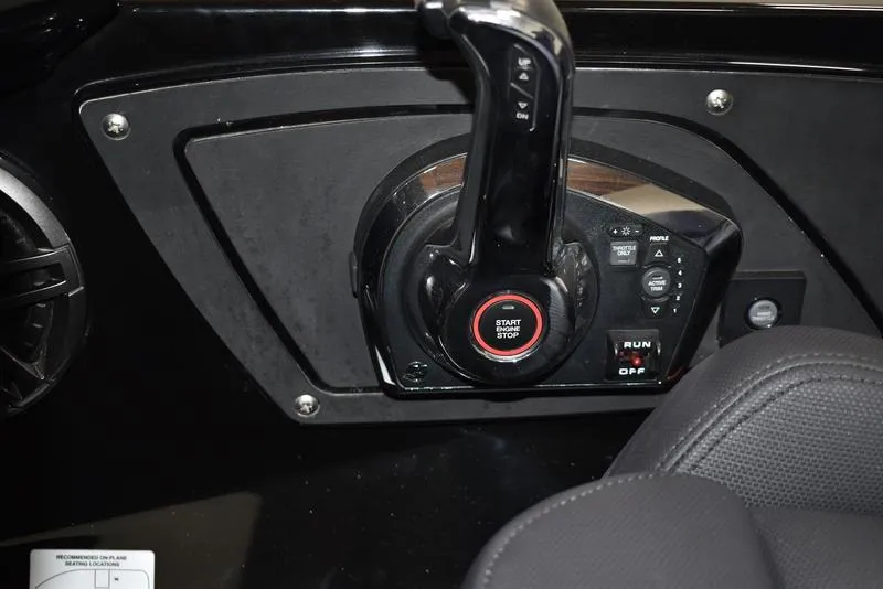 Slide: The Image of Control panel of iKon LX21 boat, featuring start/stop button and throttle lever, 2023 model. - 9