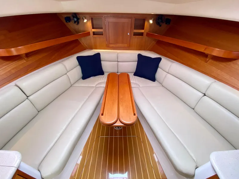 Slide: The Image of Luxurious interior of 2013 MJM 36z Downeast yacht with elegant seating and wood finishes. - 28