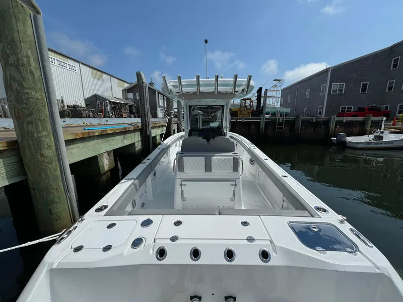 Slide: The Image of 2025 Everglades 285 Center Console boat docked at marina. - 22