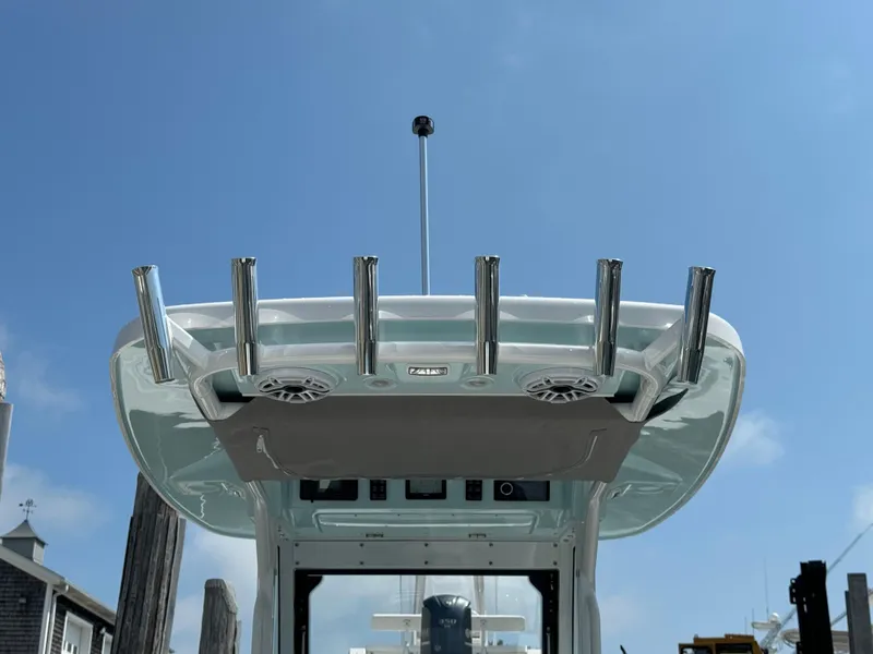 Slide: The Image of 2025 Everglades 285 Center Console boat with rod holders and speakers. - 23