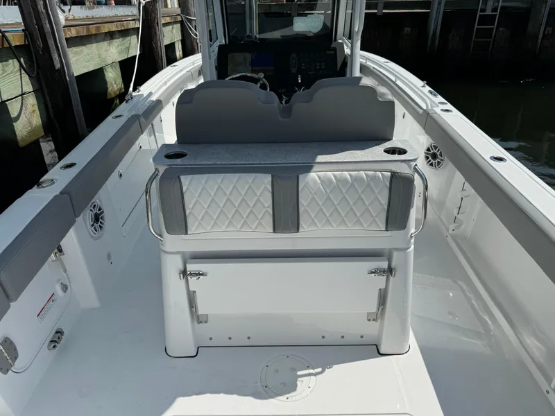 Slide: The Image of 2025 Everglades 285 Center Console boat interior with seating and console view. - 25