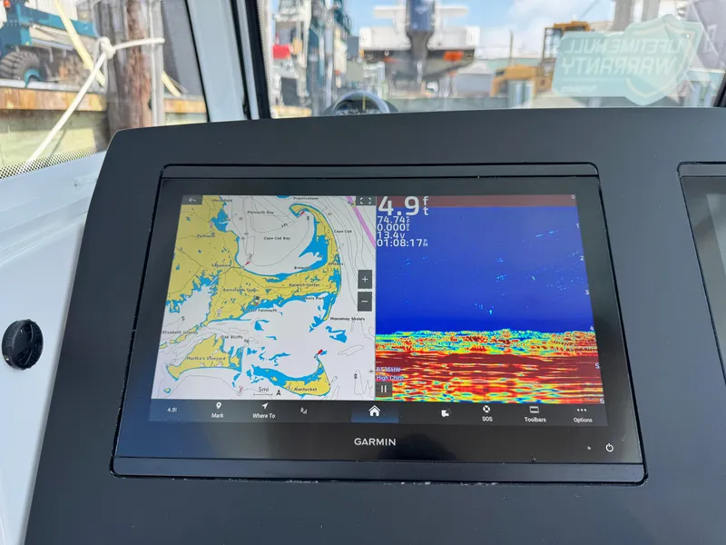 Slide: The Image of Garmin navigation display on 2025 Everglades 285 Center Console boat dashboard. - 42