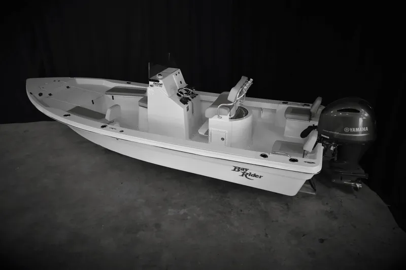 Slide: The Image of 2025 KenCraft 239 Bay Rider Bay boat with Yamaha outboard motor. - 10
