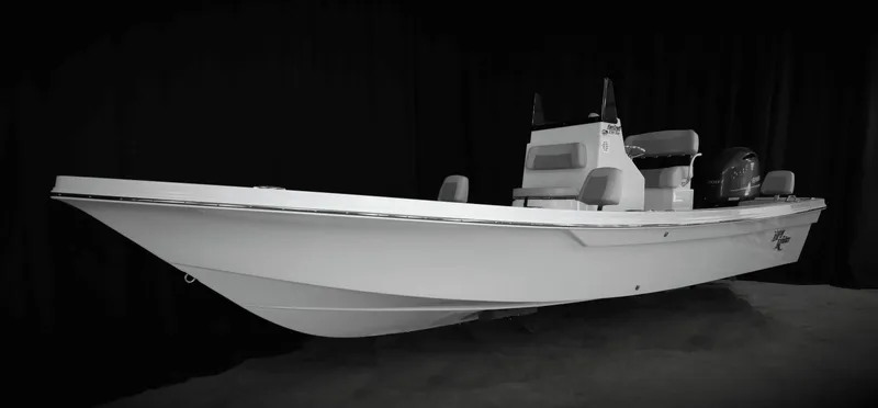 Slide: The Image of 2025 KenCraft 239 Bay Rider Bay boat in a showroom. - 11