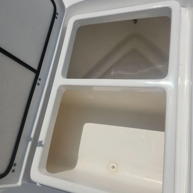 Slide: The Image of Storage compartments on a 2020 Cape Horn 17 boat. - 12