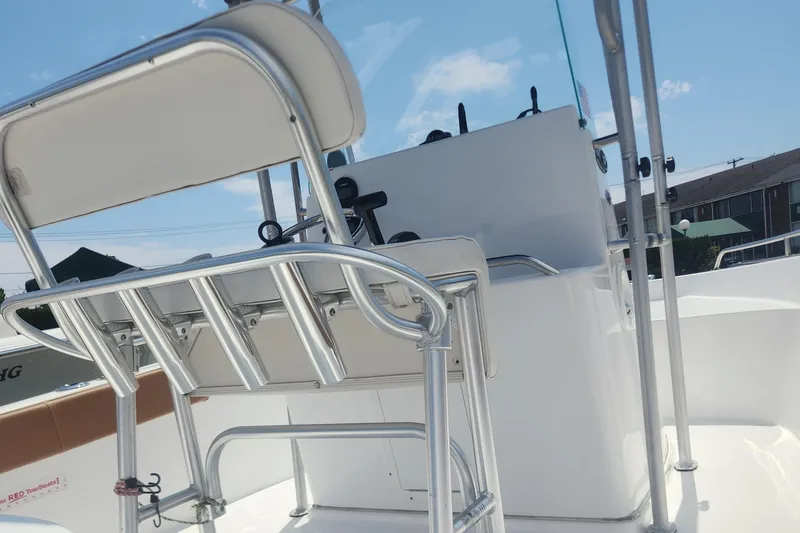 Slide: The Image of Cape Horn 17 boat interior, 2020 model, featuring a white captain's chair and control console. - 22