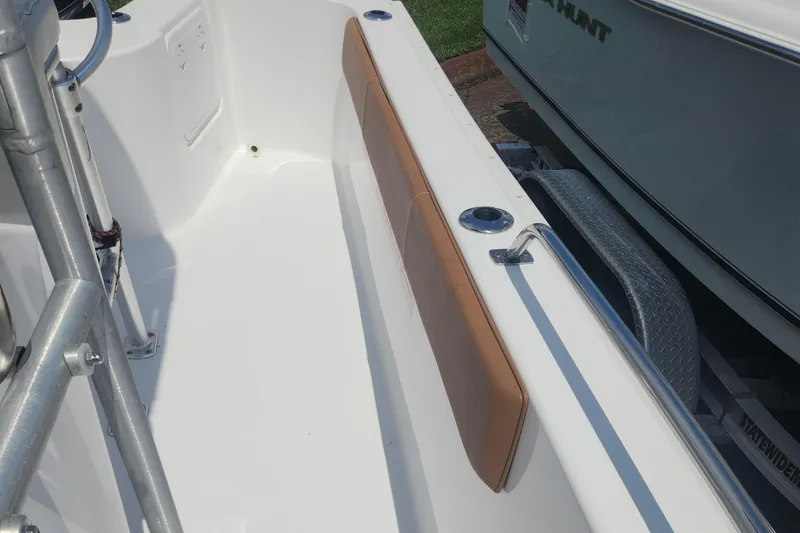 Slide: The Image of Cape Horn 17 boat interior, 2020 model, featuring white deck and brown side padding. - 23