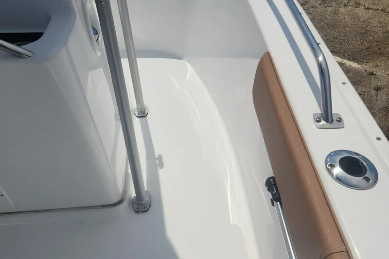 Slide: The Image of 2020 Cape Horn 17 boat interior with white deck and tan seating. - 24