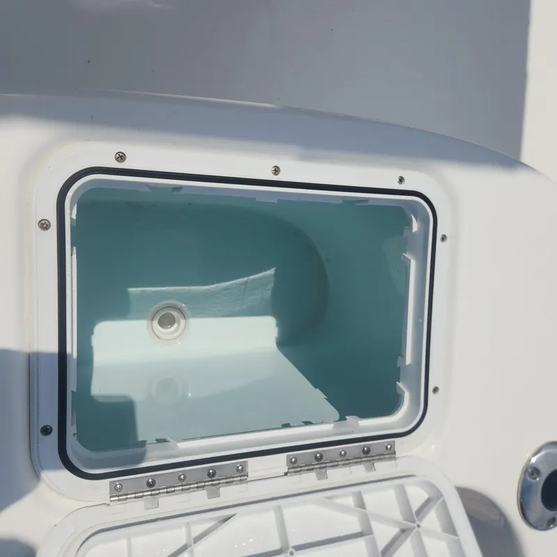 Slide: The Image of Open storage compartment on a 2020 Cape Horn 17 boat. - 7