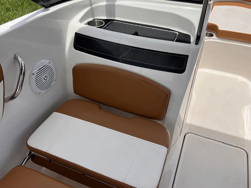 Slide: The Image of 2021 Bayliner VR5 Bowrider I/O interior seating and storage compartment. - 10