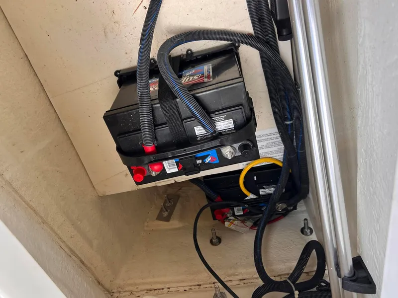 Slide: The Image of 2021 Bayliner VR5 Bowrider I/O battery compartment with wiring. - 15