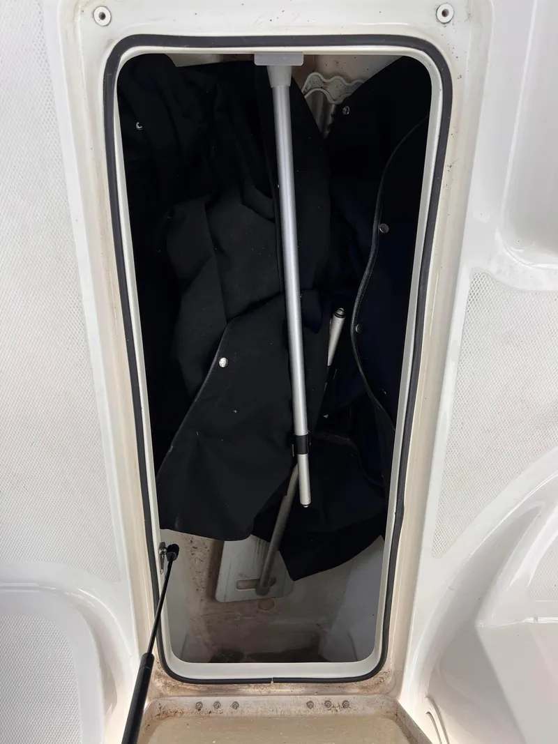 Slide: The Image of Storage compartment of a 2021 Bayliner VR5 Bowrider I/O boat. - 16