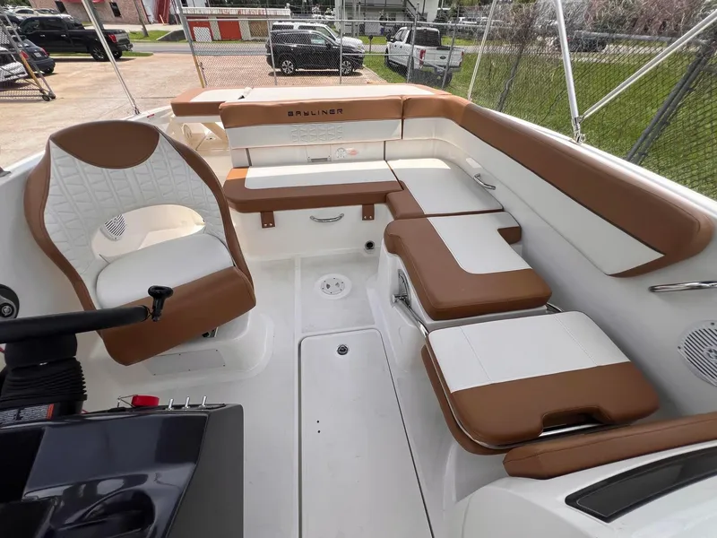 Slide: The Image of 2021 Bayliner VR5 Bowrider I/O interior with tan and white seating. - 8