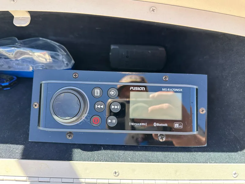 Slide: The Image of Fusion MS-RA70NSX marine stereo in a 2003 Cobalt 262 boat. - 38
