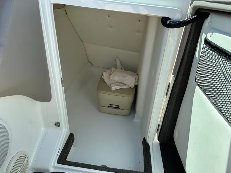 Slide: The Image of Interior storage compartment of a 2003 Cobalt 262 boat. - 41