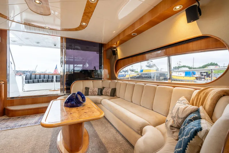 Slide: The Image of Luxurious interior of 1999 Vitech 68' Pilothouse yacht with elegant seating and decor. - 11