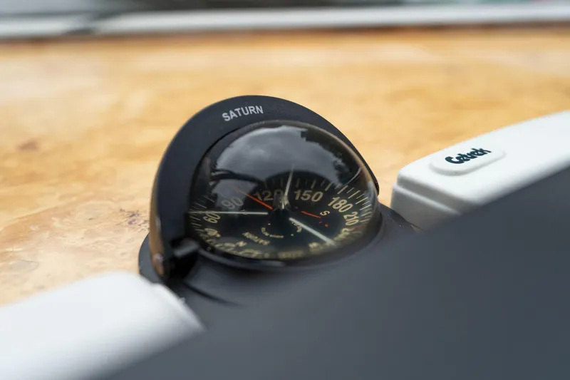 Slide: The Image of Compass on 1999 Vitech 68' Pilothouse yacht, close-up view. - 28