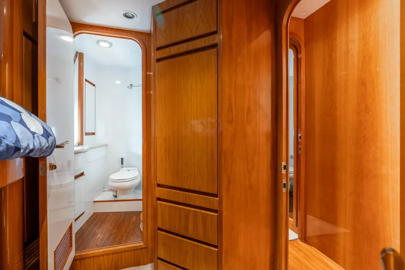 Slide: The Image of Luxurious wooden interior of 1999 Vitech 68' Pilothouse yacht bathroom. - 39