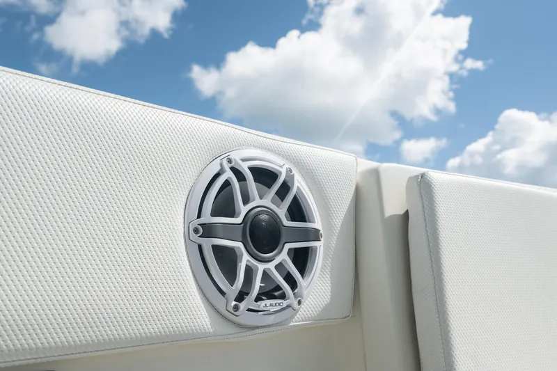 Slide: The Image of Speaker on 2000 Pursuit 2870 Center Console boat against blue sky. - 12