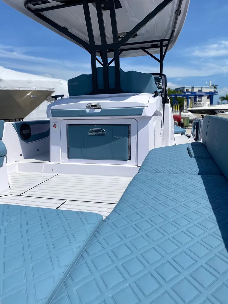 Slide: The Image of 2025 Ranieri CAYMAN 38.0 EXECUTIVE luxury boat with blue seating and modern design. - 23