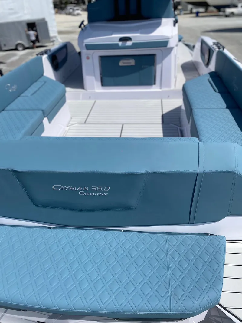 Slide: The Image of 2025 Ranieri CAYMAN 38.0 EXECUTIVE luxury boat interior with blue seating. - 25